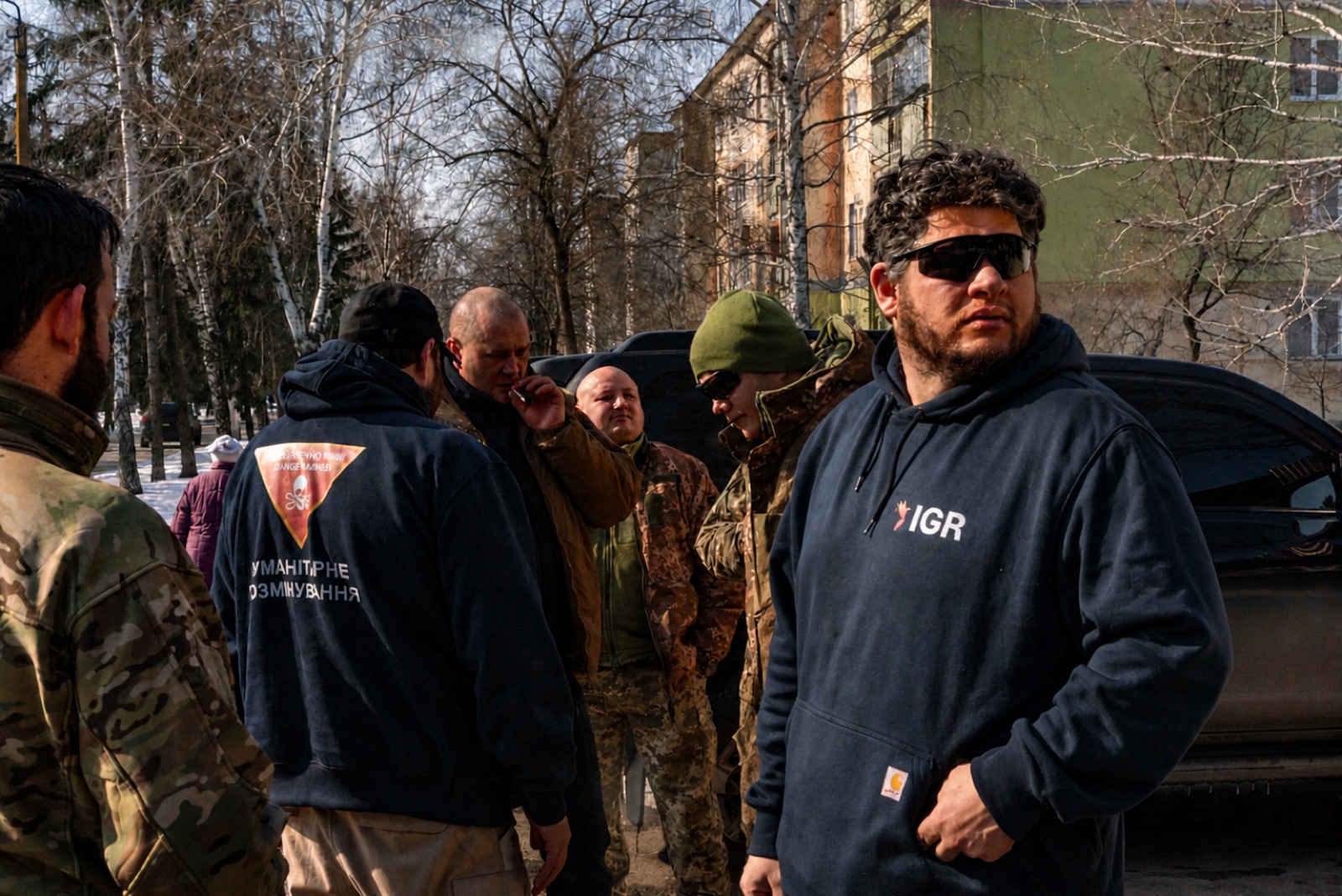 IGR personnel coordinating with Ukrainian counterparts during a winter field visit